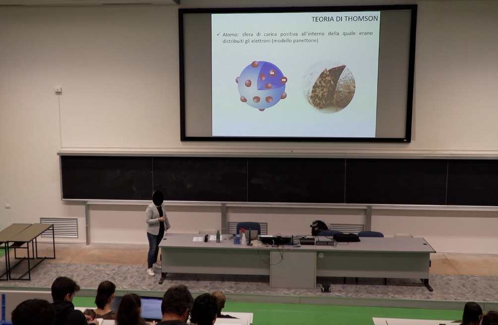 A person standing in front of a large screen

AI-generated content may be incorrect.